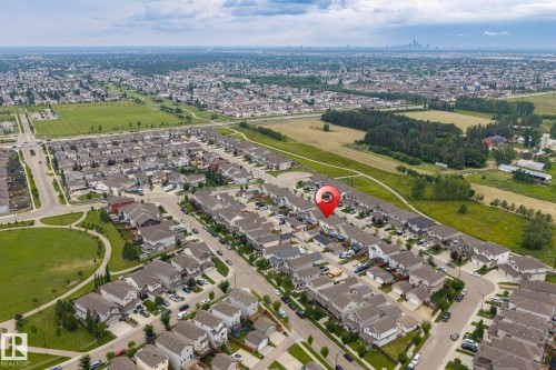 Residential neighborhood featuring green spaces and paved streets - 1209 30 Avenue Nw, Edmonton, AB - Outdoor With View