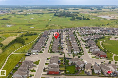 Residential neighborhood layout, featuring a prominent park area, interconnected streets, and surrounding green spaces - 1209 30 Avenue Nw, Edmonton, AB - Outdoor With View