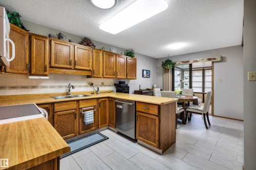 10636 153 Avenue Nw, Edmonton, AB - Indoor Photo Showing Kitchen With Double Sink