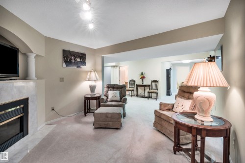 10636 153 Avenue Nw, Edmonton, AB - Indoor Photo Showing Living Room With Fireplace