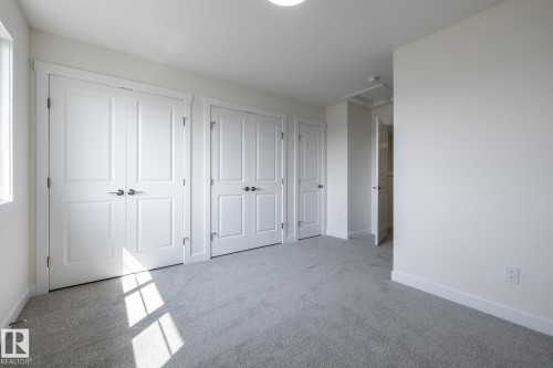 #25 7020 Keswick Cm Sw, Edmonton, AB - Indoor Photo Showing Other Room