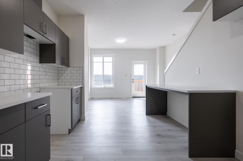 #25 7020 Keswick Cm Sw, Edmonton, AB - Indoor Photo Showing Other Room