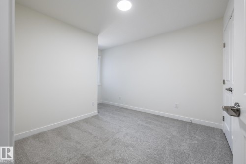 #25 7020 Keswick Cm Sw, Edmonton, AB - Indoor Photo Showing Other Room