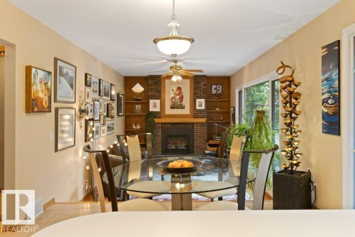 2 Greenwood Place, St. Albert, AB - Indoor Photo Showing Dining Room With Fireplace