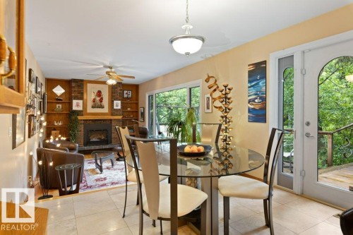 2 Greenwood Place, St. Albert, AB - Indoor Photo Showing Dining Room With Fireplace