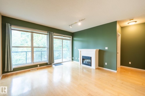 #412 11039 83 Av Nw, Edmonton, AB - Indoor With Fireplace