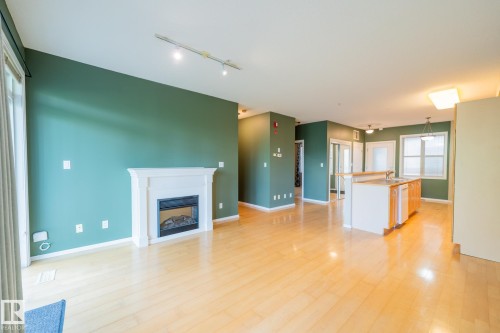 #412 11039 83 Av Nw, Edmonton, AB - Indoor Photo Showing Living Room With Fireplace