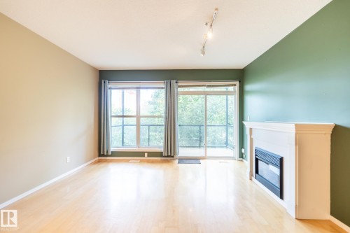 #412 11039 83 Av Nw, Edmonton, AB - Indoor With Fireplace