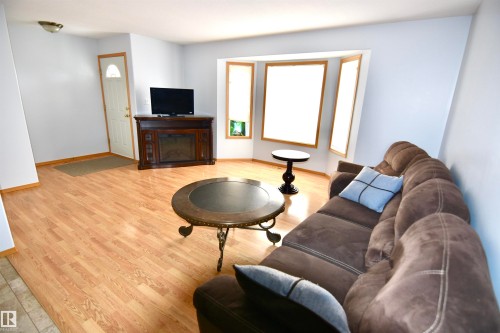 4820 49 Avenue, St. Paul Town, AB - Indoor Photo Showing Living Room With Fireplace