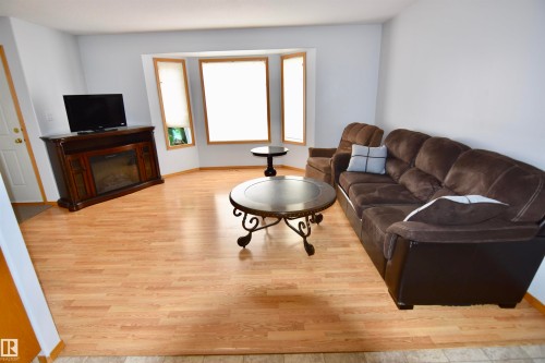 4820 49 Avenue, St. Paul Town, AB - Indoor Photo Showing Living Room With Fireplace