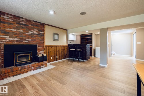 12 Amherst Crescent, St. Albert, AB - Indoor Photo Showing Living Room With Fireplace