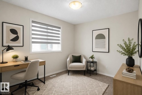 Recessed window featuring horizontal blinds, light-toned walls, and ceiling-mounted lighting - 8432 18 Avenue Sw, Edmonton, AB - Indoor Photo Showing Office