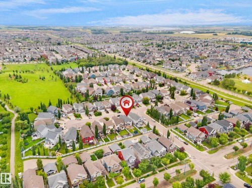 Expansive residential development featuring detached homes, organized street layouts, and a substantial green space - 8432 18 Avenue Sw, Edmonton, AB - Outdoor With View