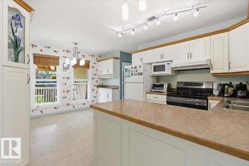 128 Green Ash Drive, Wetaskiwin, AB - Indoor Photo Showing Kitchen With Double Sink