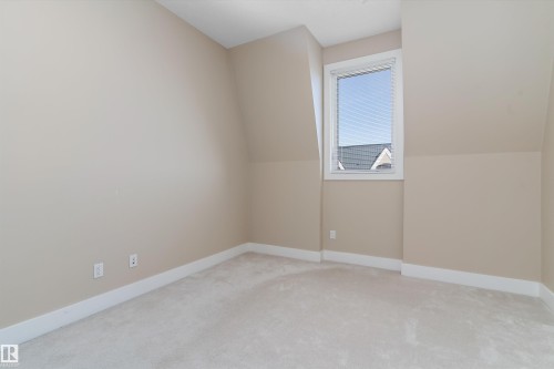 #449 6079 Maynard Wy Nw, Edmonton, AB - Indoor Photo Showing Other Room