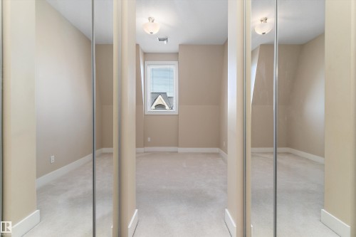 #449 6079 Maynard Wy Nw, Edmonton, AB - Indoor Photo Showing Other Room