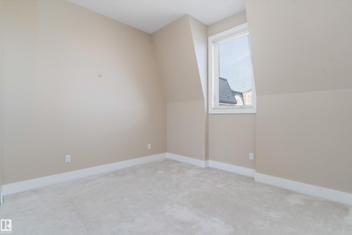 #449 6079 Maynard Wy Nw, Edmonton, AB - Indoor Photo Showing Other Room