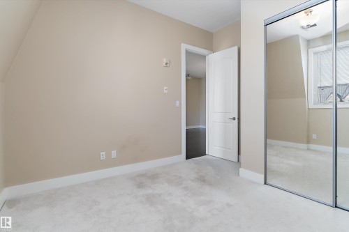 #449 6079 Maynard Wy Nw, Edmonton, AB - Indoor Photo Showing Other Room