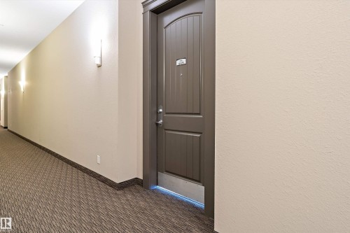 #449 6079 Maynard Wy Nw, Edmonton, AB - Indoor Photo Showing Other Room