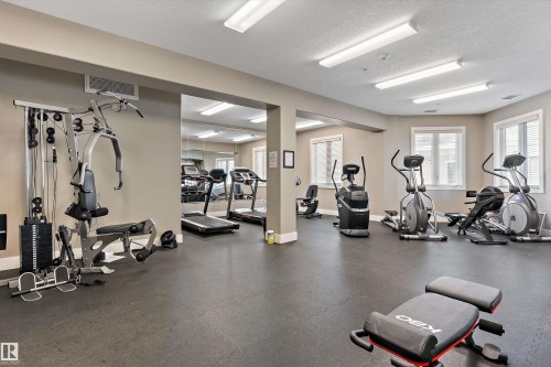 #449 6079 Maynard Wy Nw, Edmonton, AB - Indoor Photo Showing Gym Room