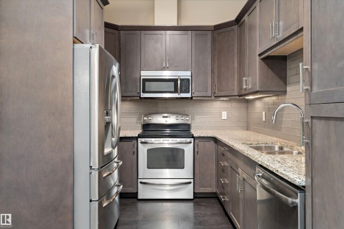 #449 6079 Maynard Wy Nw, Edmonton, AB - Indoor Photo Showing Kitchen With Double Sink With Upgraded Kitchen