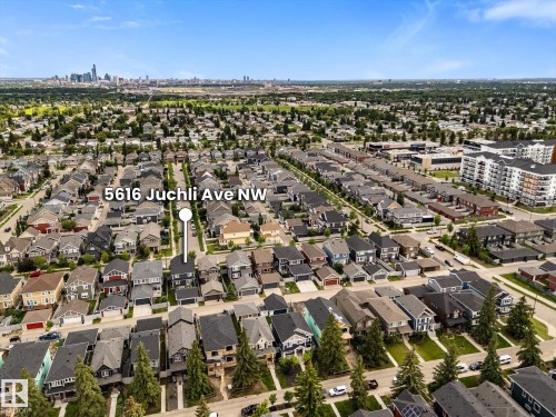 Residential neighborhood with varied architectural styles and mature trees - 5616 Juchli Avenue Nw, Edmonton, AB - Outdoor With View