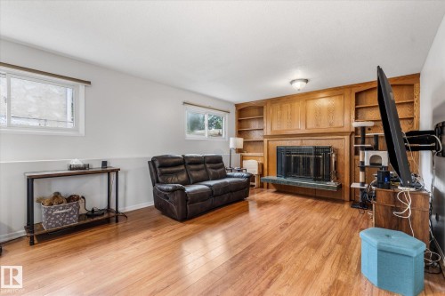 3 Windermere Drive, Spruce Grove, AB - Indoor Photo Showing Living Room With Fireplace