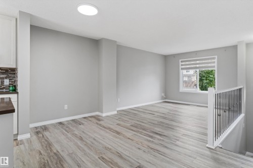 #98 4050 Savaryn Dr Sw, Edmonton, AB - Indoor Photo Showing Other Room