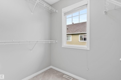 #98 4050 Savaryn Dr Sw, Edmonton, AB - Indoor With Storage