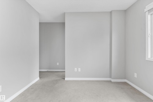 #98 4050 Savaryn Dr Sw, Edmonton, AB - Indoor Photo Showing Other Room