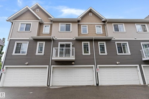 #98 4050 Savaryn Dr Sw, Edmonton, AB - Outdoor With Facade