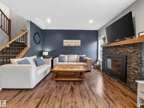 156 Sturtz Bend, Leduc, AB - Indoor Photo Showing Living Room With Fireplace