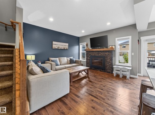 156 Sturtz Bend, Leduc, AB - Indoor Photo Showing Living Room With Fireplace