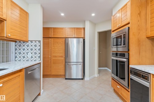#7 14824 45 Av Nw, Edmonton, AB - Indoor Photo Showing Kitchen With Stainless Steel Kitchen