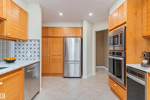 #7 14824 45 Av Nw, Edmonton, AB - Indoor Photo Showing Kitchen With Stainless Steel Kitchen