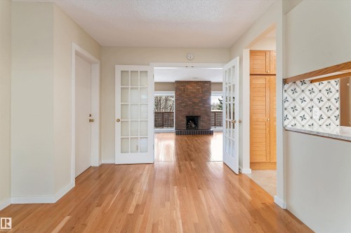 #7 14824 45 Av Nw, Edmonton, AB - Indoor With Fireplace