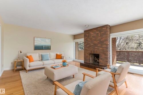 #7 14824 45 Av Nw, Edmonton, AB - Indoor Photo Showing Living Room With Fireplace