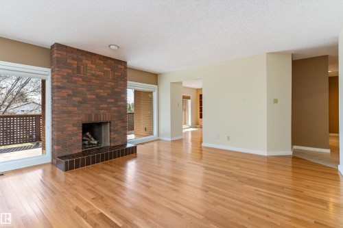 #7 14824 45 Av Nw, Edmonton, AB - Indoor Photo Showing Living Room With Fireplace