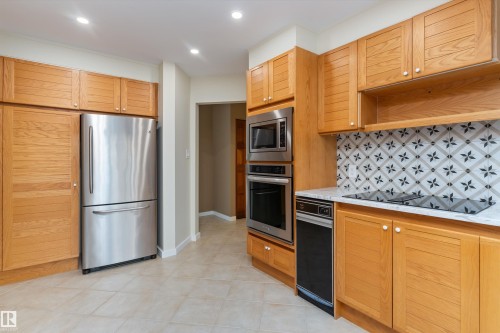 #7 14824 45 Av Nw, Edmonton, AB - Indoor Photo Showing Kitchen With Stainless Steel Kitchen