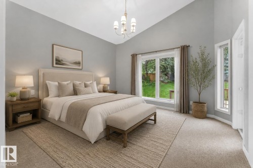 Vaulted ceiling with chandelier, large picture window, additional vertical window, light gray wall paint, and beige carpet flooring - 8 Osborne Close, St. Albert, AB - Indoor Photo Showing Bedroom