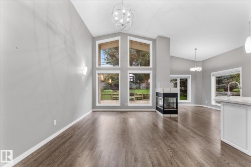 Vaulted ceilings, wood-finish flooring, and expansive windows - 8 Osborne Close, St. Albert, AB - Indoor