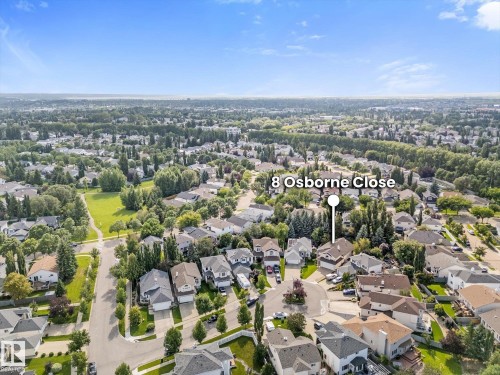 Aerial perspective showcasing residential properties, tree-lined streets, and expansive green spaces - 8 Osborne Close, St. Albert, AB - Outdoor With View