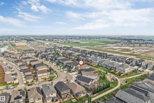 Aerial perspective highlighting a residential development with varied architectural styles - 329 Balsam Link, Leduc, AB - Outdoor With View