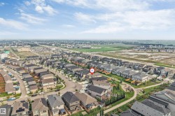 Aerial perspective highlighting a residential development with varied architectural styles - 