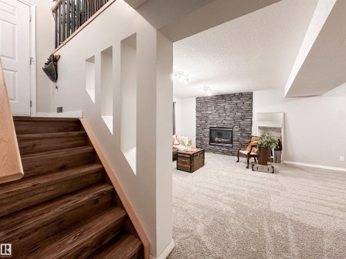 37 Ash Crescent, St. Albert, AB - Indoor Photo Showing Other Room With Fireplace