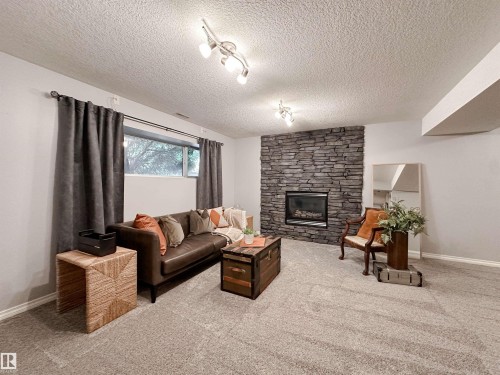37 Ash Crescent, St. Albert, AB - Indoor Photo Showing Living Room With Fireplace