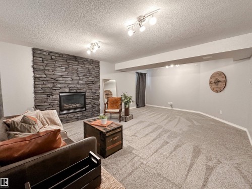 37 Ash Crescent, St. Albert, AB - Indoor Photo Showing Living Room With Fireplace