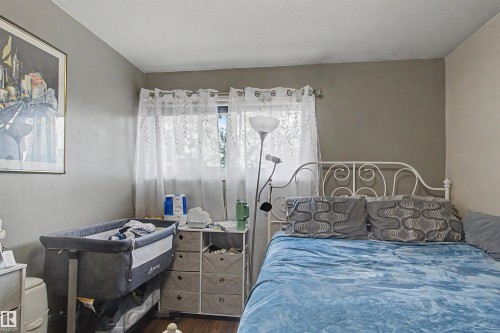Window with sheer curtains - 5724 143 Avenue Nw, Edmonton, AB - Indoor Photo Showing Bedroom