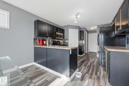 73 Dalquist Bay, Leduc, AB - Indoor Photo Showing Kitchen