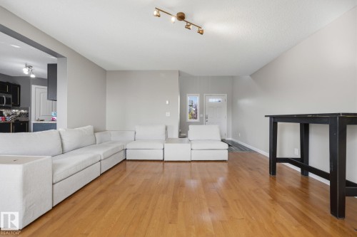 73 Dalquist Bay, Leduc, AB - Indoor Photo Showing Living Room